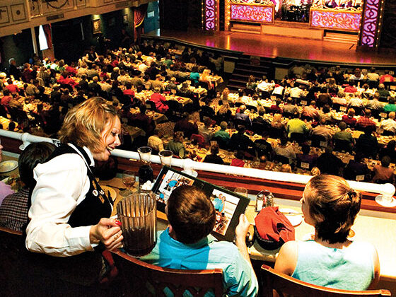 a family watching a theatre show at Branson